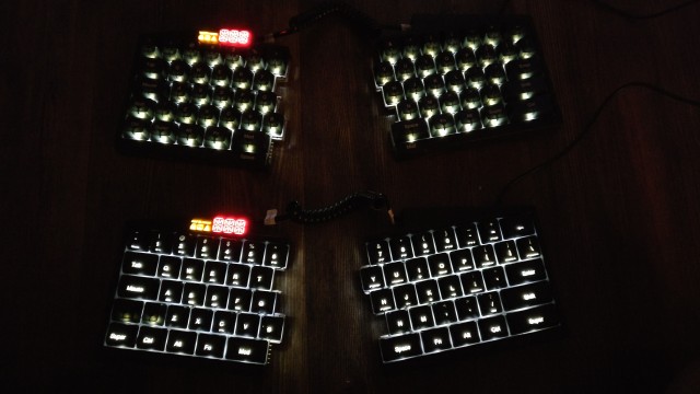 Backlit UHK prototypes at night