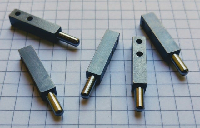 Guides with spherical pins